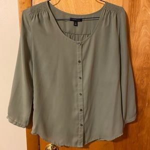 Green blouse, thin and breathable fabric and true to size.